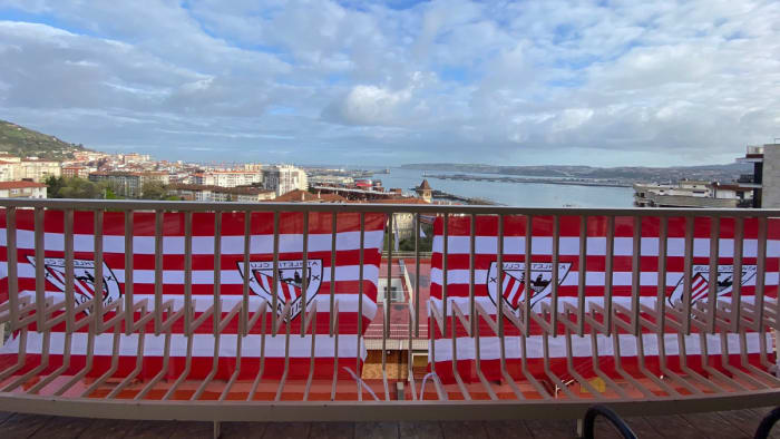 Athletic Bilbao banners hang on city balconies in anticipation of two Copa del Rey finals